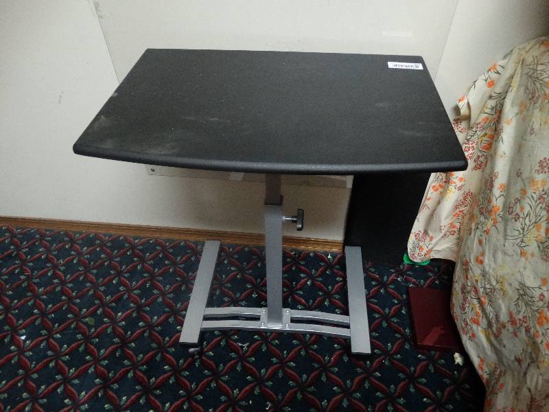 lot 905 image: Adjustable Table on Wheels