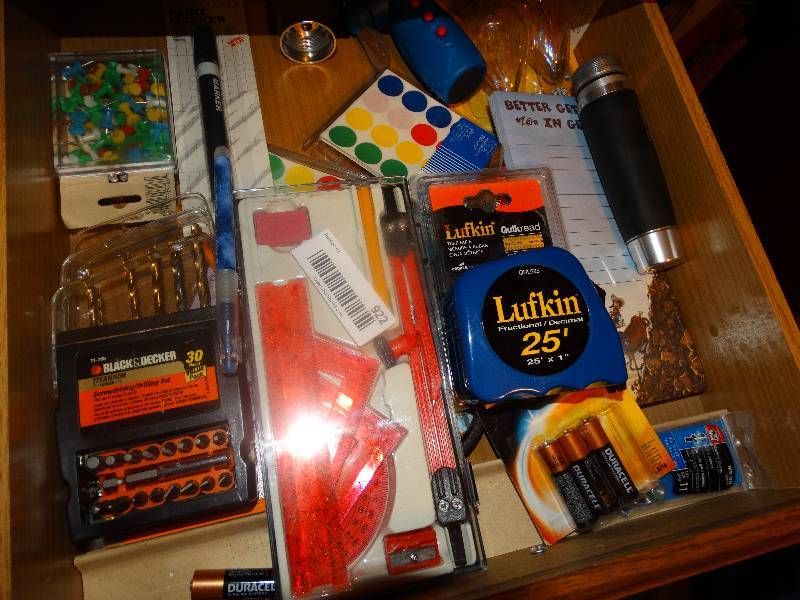 lot 922 image: Desk Drawer Contents - Tape Measure, Pens, Paper, & misc.