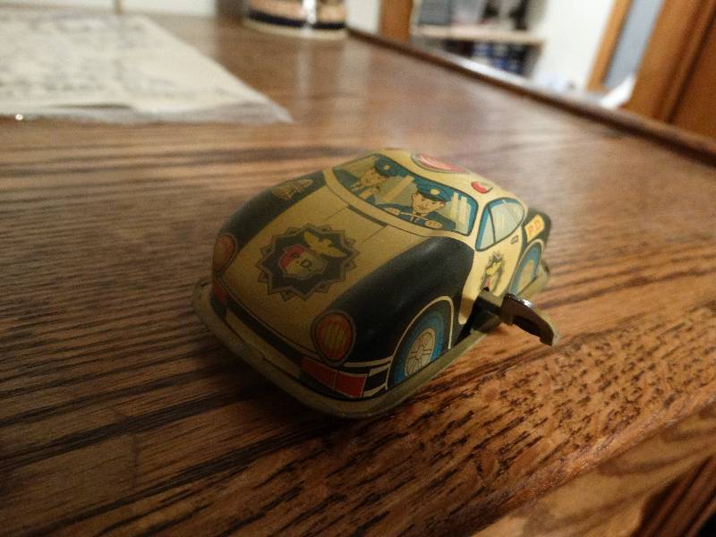 lot 942 image: Antique Metal Windup Police Car