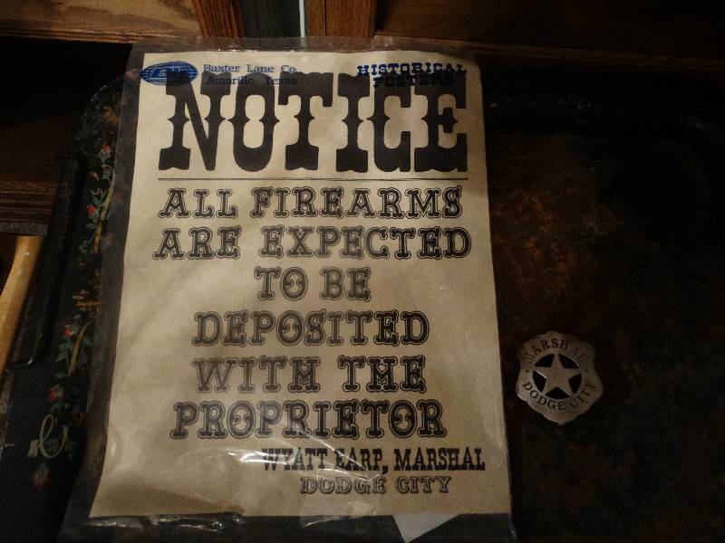 lot 943 image: Replica Badge & Notice Poster (Wyatt Earp)