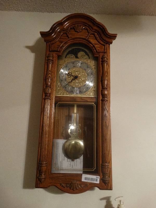 lot 946 image: Howard Miller Oak Frame Wall Clock - 71st Anniversay