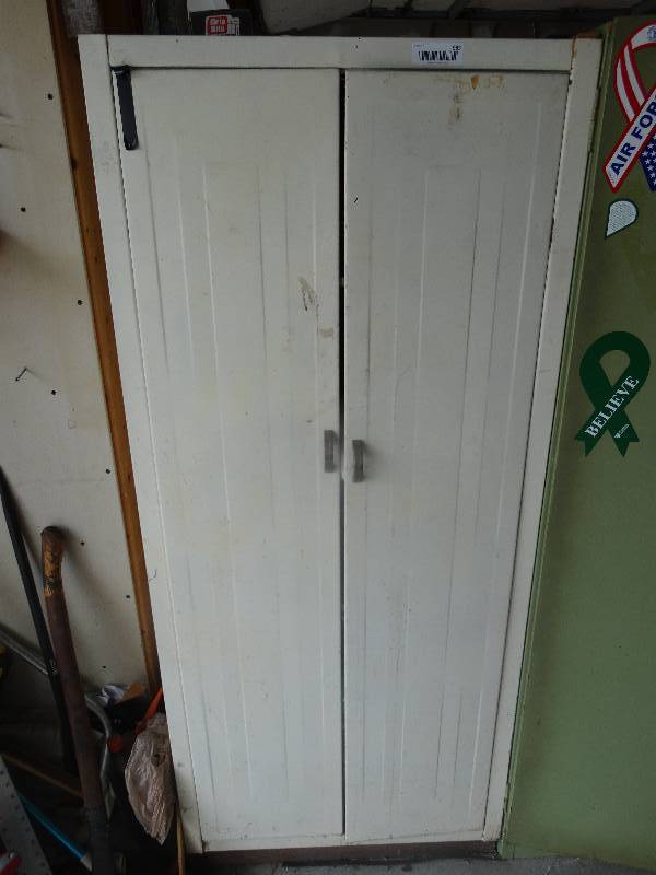lot 983 image: 2 door metal cabinet w contents.