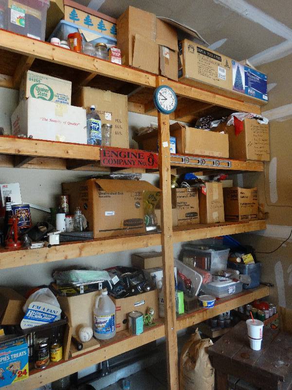 lot 1621 image: Contents of shelving in garage- Christmas decor, coolers, home decor, tools, hardware, misc.