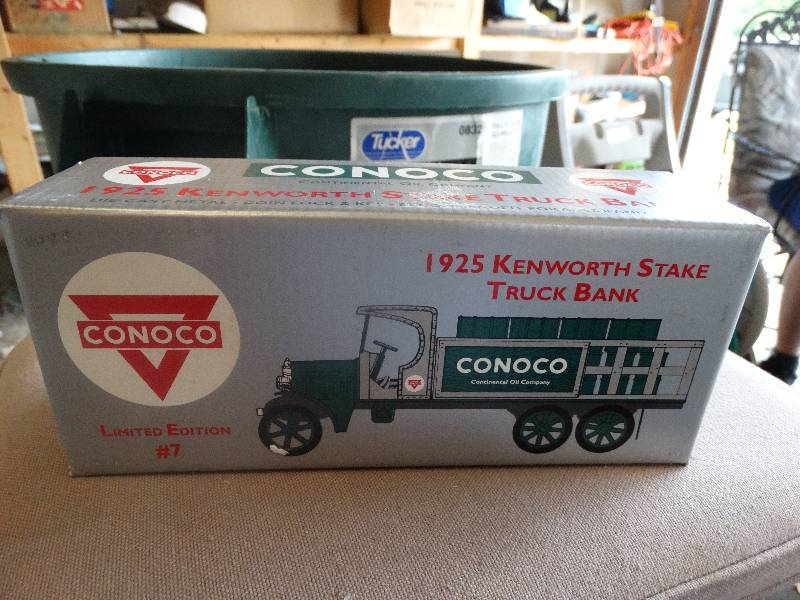 lot 1647 image: Conoco 1925 Kenworth stake truck bank in box