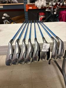 lot 28 image: 8- king cobra irons, fiberglass shafts, 5-GW