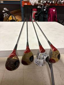 lot 42 image: 4- persimmon woods golf clubs, Mizuna