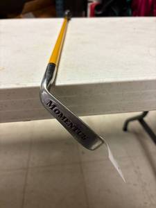 lot 52 image: Momentus left hand swing trainer