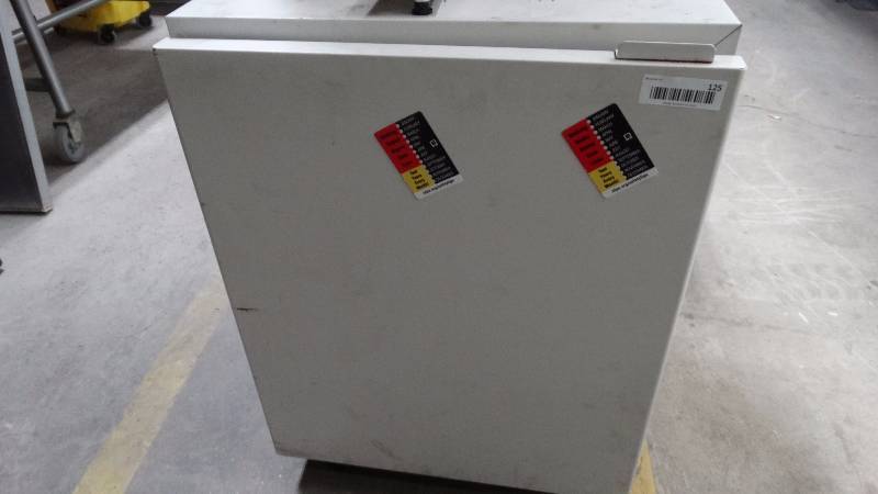 lot 125 image: Metal storage cabinet on wheels