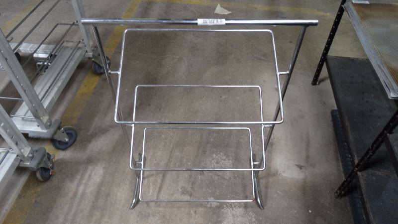 lot 144 image: Stainless counter top tray holder for cookies or bread