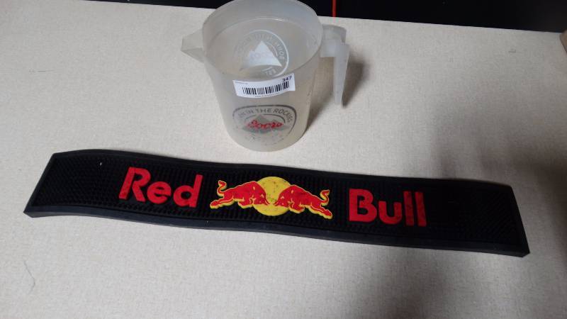 lot 347 image: Coors beer pitcher & Red Bull bar mat