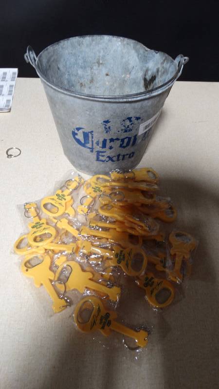 lot 348 image: Corona beer bucket & 30 Corona bottle openers
