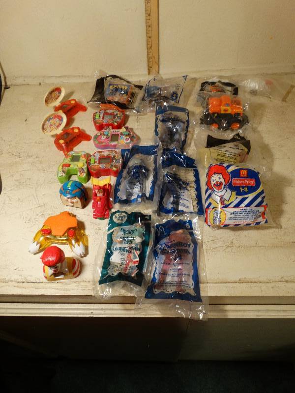 lot 103 image: Assorted lot of McDonalds Toys.