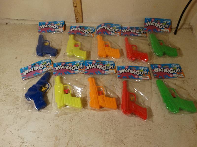 lot 112 image: Lot of 10 New in Package Water Guns.