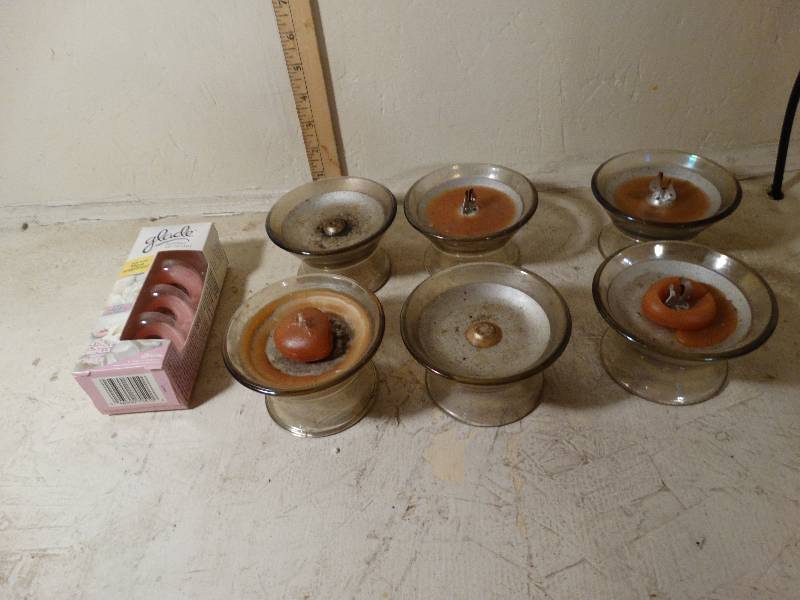 lot 139 image: Candles and holders.