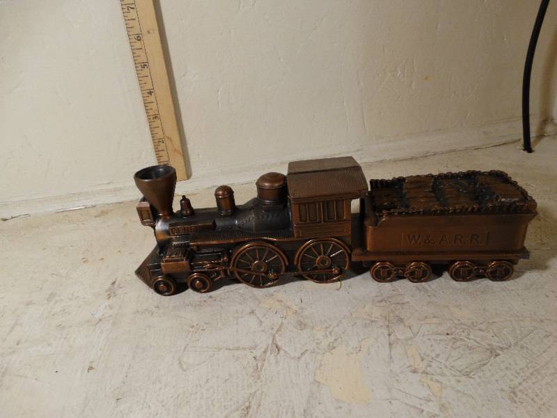 lot 156 image: Heavy metal train and car.