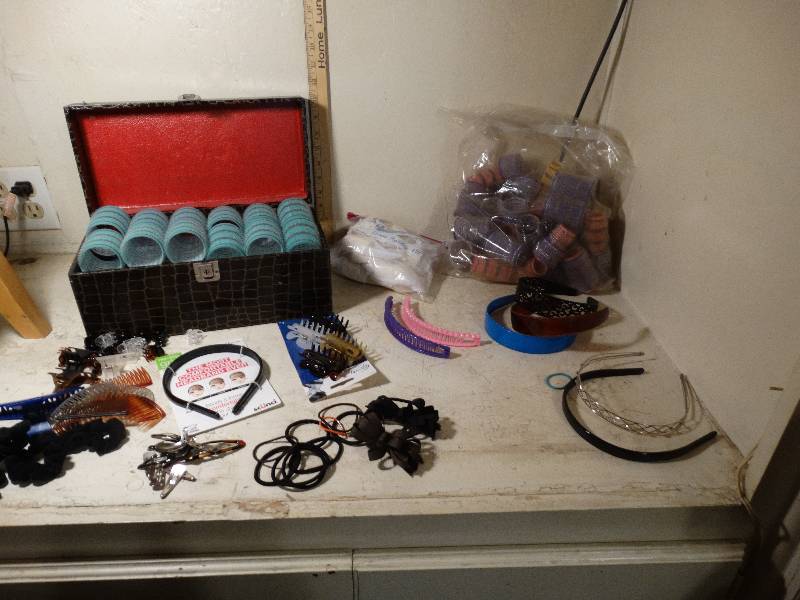 lot 160 image: Assorted lot of hair rollers and hair accessory.