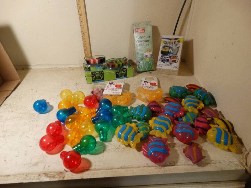 lot 163 image: Assorted pottery supplies, fish lights covers and candles etc.