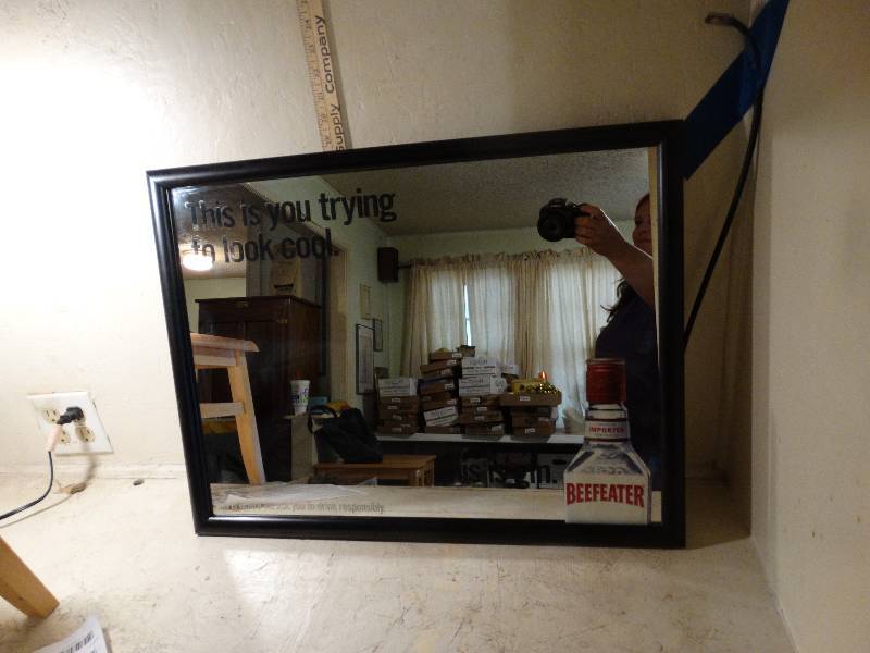 lot 180 image: Beefeater mirror 25 12 w 19 12 t