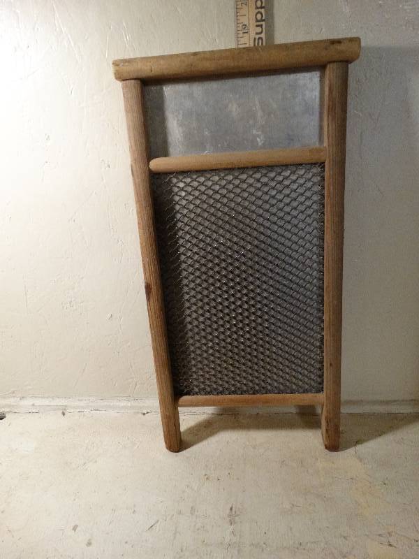 lot 182 image: Old washboard. 18 34 t 10 w.