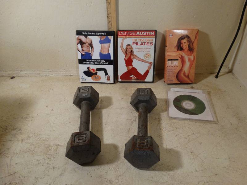 lot 211 image: 8lbs metal dumbbells and workout videos.