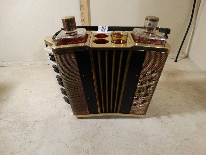 lot 216 image: Vintage Accordian Liquor Decanter Music Box.