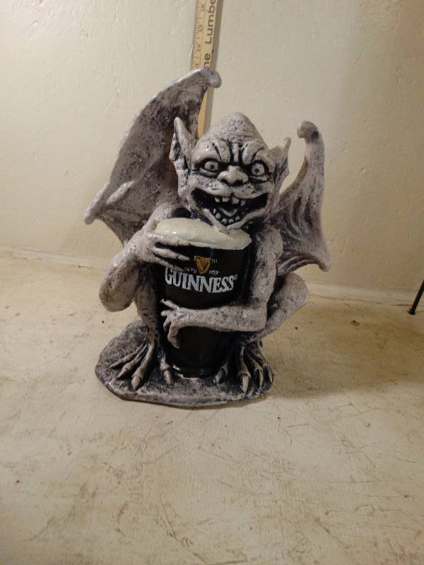 lot 224 image: 13 Tall Guinness Gargoyle.