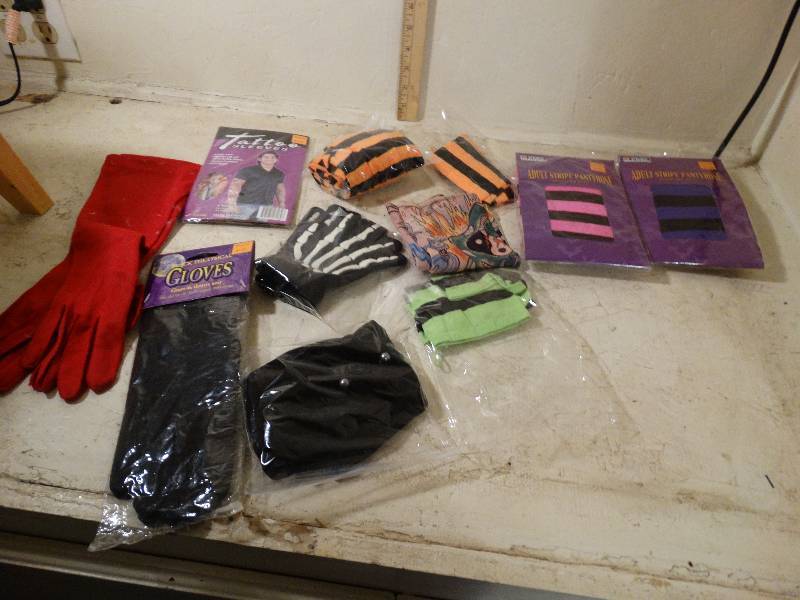 lot 234 image: Assorted Costume stocking, tattoo sleeve, gloves.