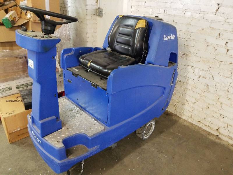 lot 3264 image: Clarke battery powered ride on floor scrubber