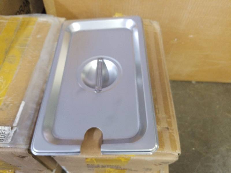 lot 3270 image: 23 New slotted fourth size stainless lids