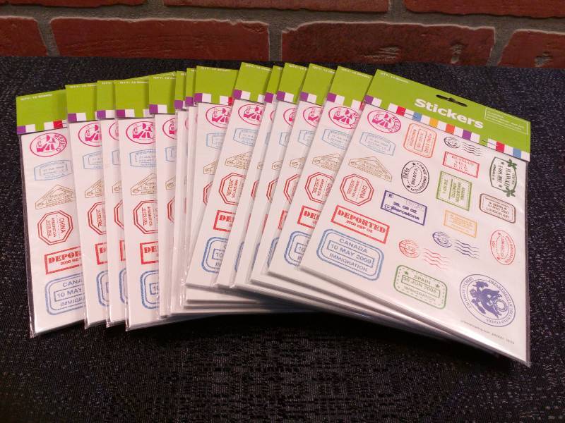 lot 22 image: Passport Country Stamp Sticker Sheets