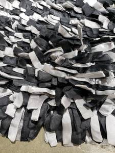 lot 6251 image: Dreamweavers 5ft x 7ft Black and Silver Polyester Ribbon Shag Area Rug Previously Owned