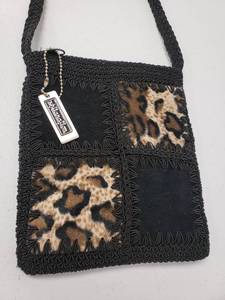 lot 10000013 image: Xhilaration 6.5x7.5 Inch Black and Leapord Print Crossbody Crochet Knit Handbag with 21 Inch Shoulder Strap