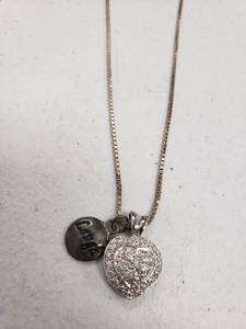 lot 10000062 image: Silver Heart Laugh Pendant Necklace