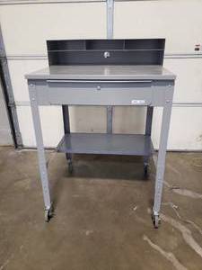 lot 67149 image: Uline Standard Flat Top Shop Desk with 4.4 Inch Casters - 34.5in W x 30in Dx 36-42.5in H