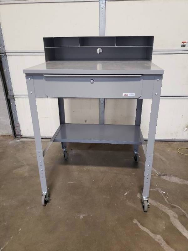 lot 967149 image: Uline Standard Flat Top Shop Desk with 4.4 Inch Casters - 34.5in W x 30in Dx 36-42.5in H