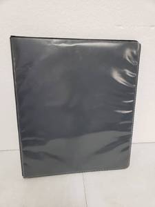 lot 6823 image: Black 1 Inch 3-Ring Notebook with 15 Sheet Protectors
