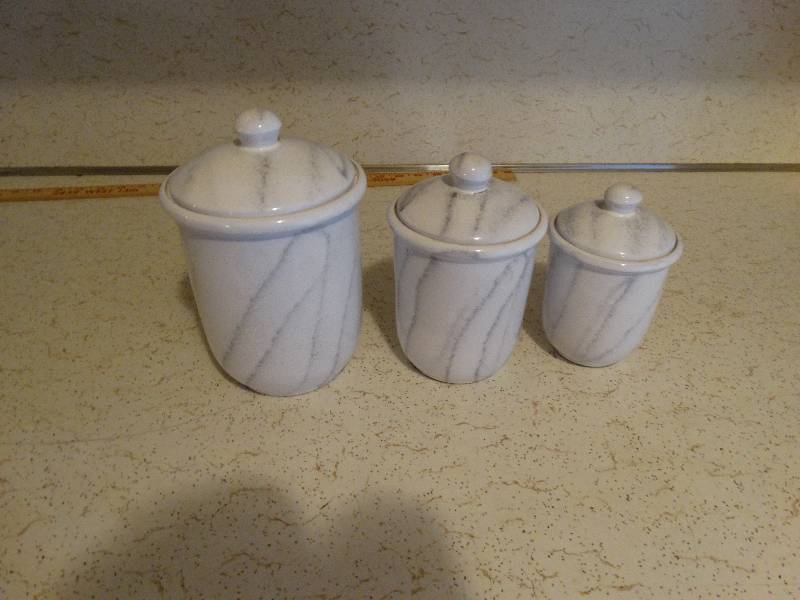 lot 360 image: Set of Three Ceramic storage canisters.