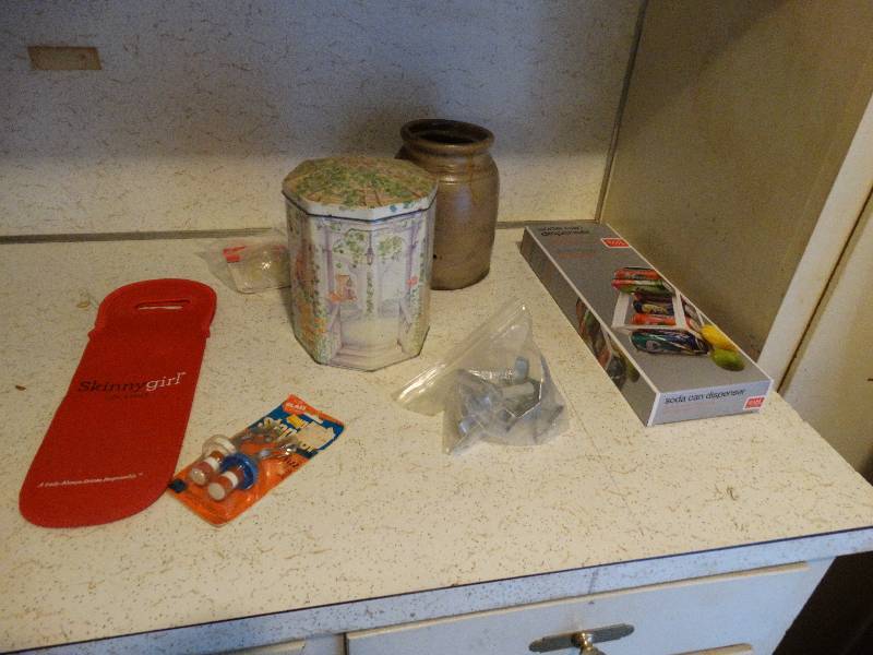 lot 395 image: Old crock, soda can dispenser, insulated wine bottle toat.