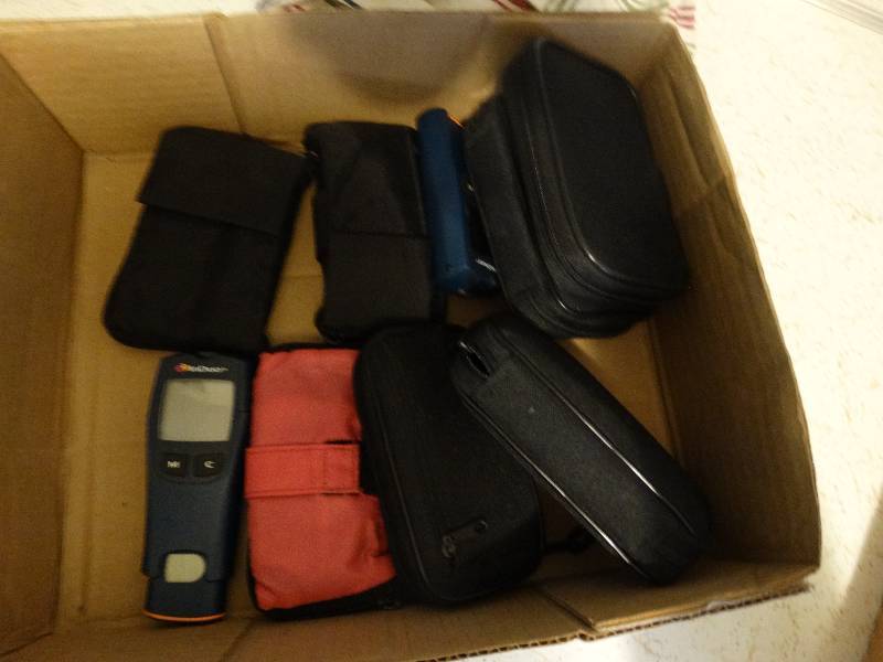 lot 406 image: Misc zipper cases. accuchek meters.