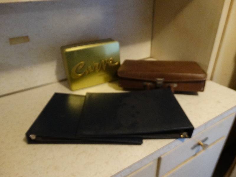 lot 422 image: Misc cases , cheek book binders. tin can.