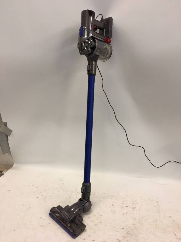 lot 27 image: DYSON CORDLESS RECHARGEABLE VACUUM WITH ATTACHMENTS