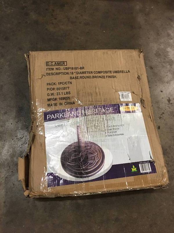 lot 138 image: PATIO UMBRELLA STAND NEW IN BOX
