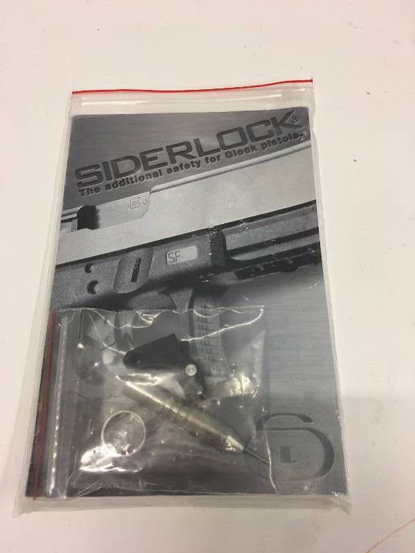 lot 155 image: NEW GLOCK SIDERLOCK TRIGGER  ADDS A SAFETY BUTTON FOR THE GLOCK PISTOL
