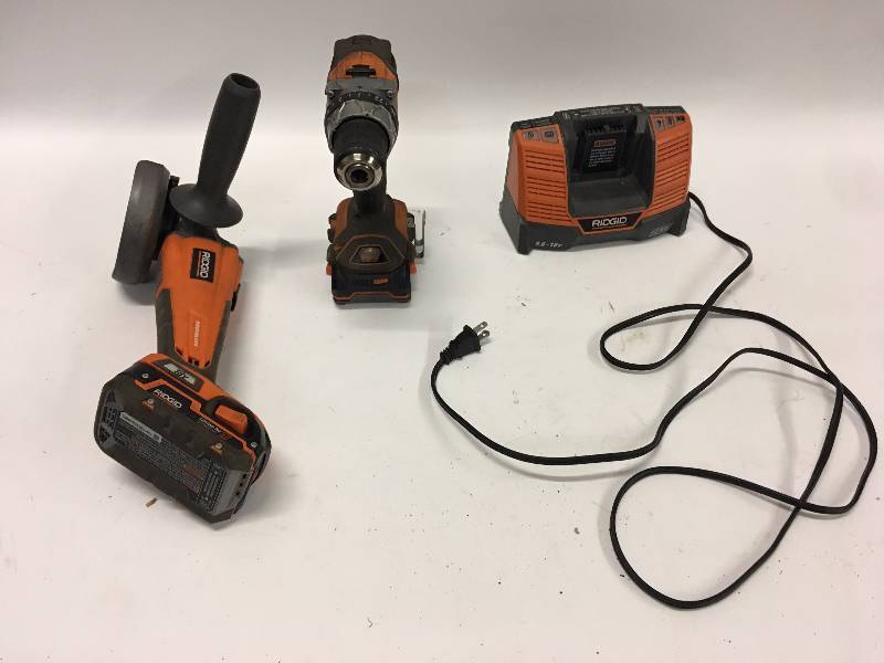 lot 172 image: NICE SET OF RIDGID TOOLS DRILL BRUSHLESS ANGLE GRINDER 2 BATTERIES AND CHARGER