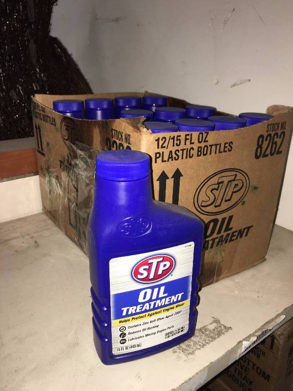 lot 251 image: Case of 12 qty STP oil treatment