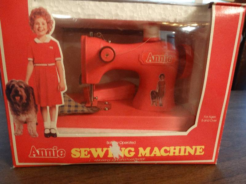lot 104 image: Mini Vintage Annie sewing machine.