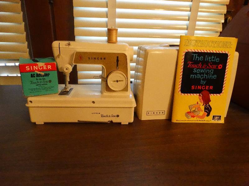 lot 114 image: Mini Vintage Little touch and sew Singer sewing machine.