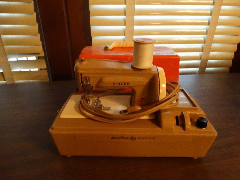 lot 145 image: Mini vintage singer sewing machine.