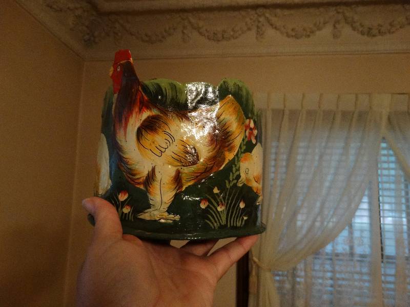 lot 192 image: Tin Rooster Planter.