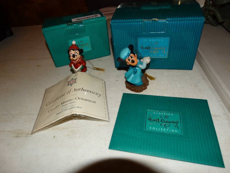 lot 202 image: Caroler Minnie-Ornament Minnie Mouse Plutos Christmas Tree and Mrs. Crachit Minnie Mouse from Mickeys Christmas Carol.